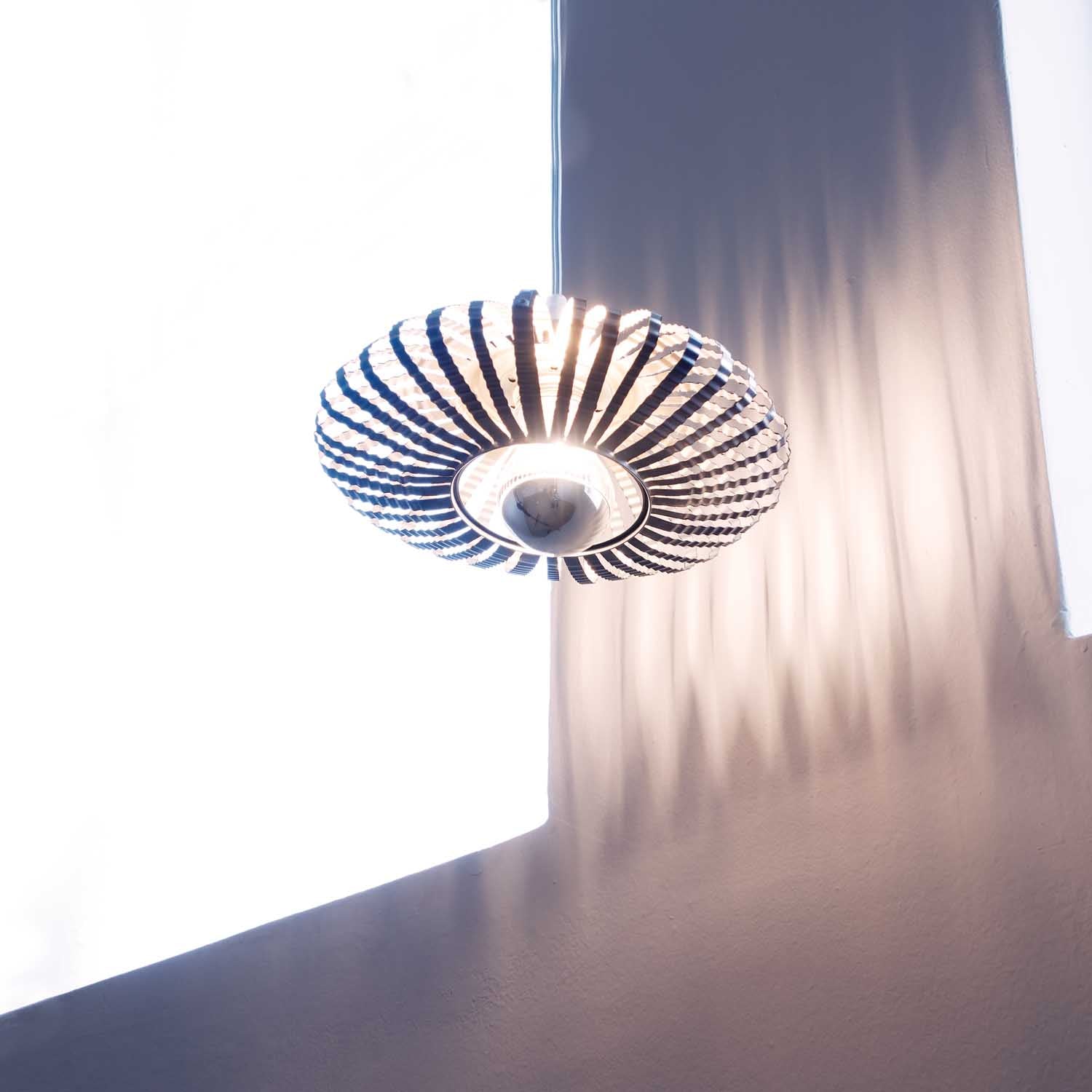 Eco-Friendly Brilliance: Recycled Metal Celeste Light