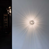 Soft Starburst Illumination: Celeste Handcrafted Wall Fixture