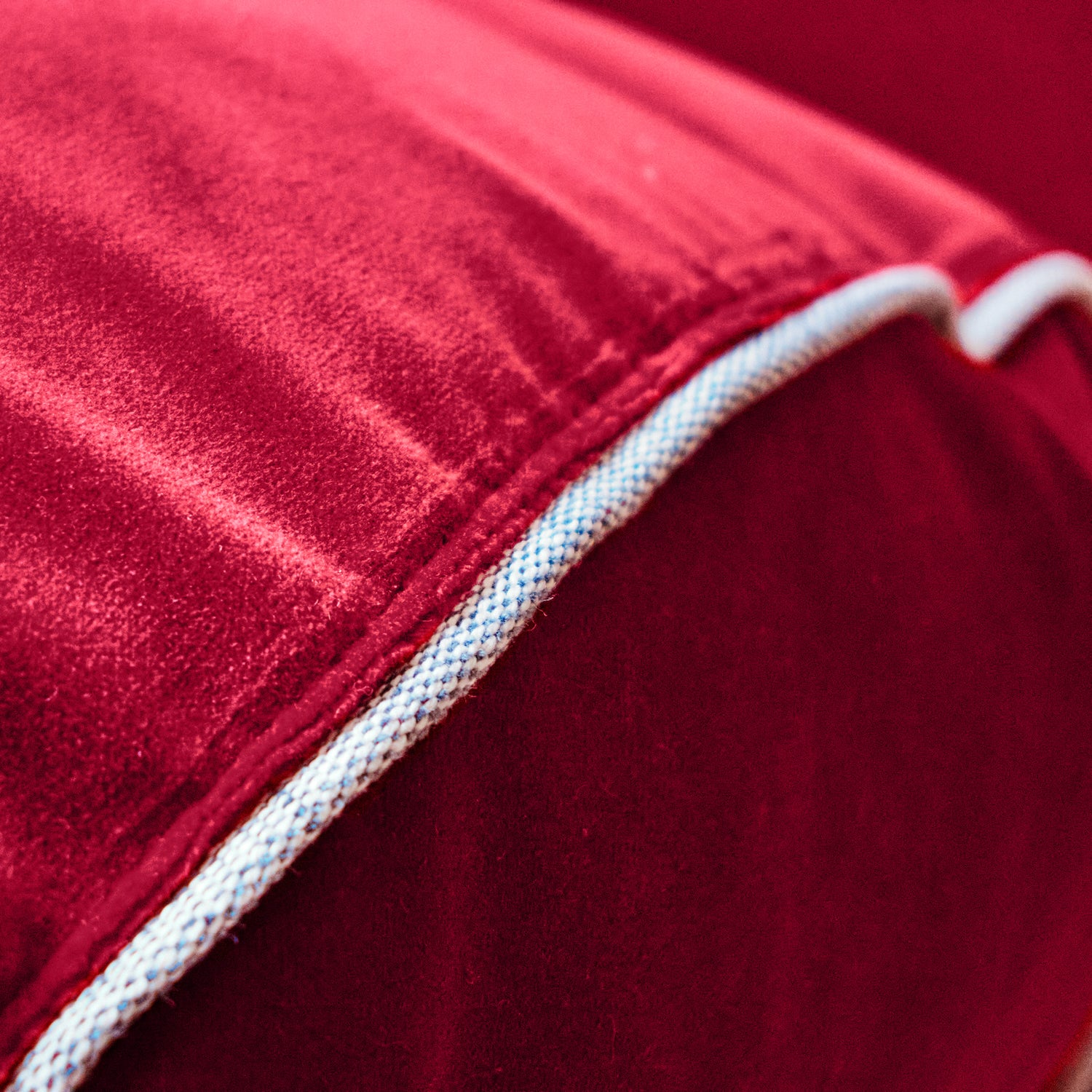 Luxurious upholstery with contrasting piping.