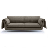 Experience Italian craftsmanship with Casquet. brown linen sofa.
