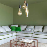 green living room linen sofa in natural textiles