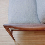 Demetra Armchair in Elegant Walnut.