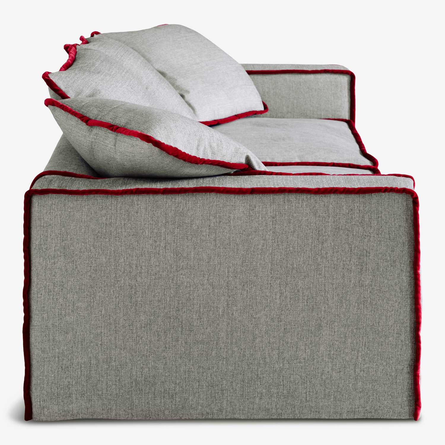 Smooth Luxury Redefined: Rafaella 3-Seater Sofa. red contrasting trim.