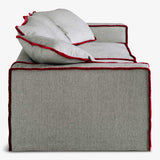 Smooth Luxury Redefined: Rafaella 3-Seater Sofa. red contrasting trim.