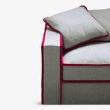 red contrast trim sustainable sofa detail.
