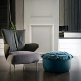 Pouf with Playful Capitonne Detailing