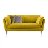 Luminous Polished Aluminum Feet Detail. Yellow cotton sofa.