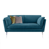 Adjustability for Maximum Comfort. petrol coloured sofa.
