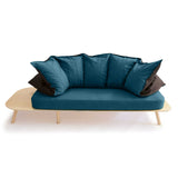 Thoughtful Table Element for Display. blue cotton sofa.