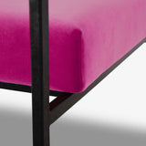 pink velvet upholstered lounge chair detail