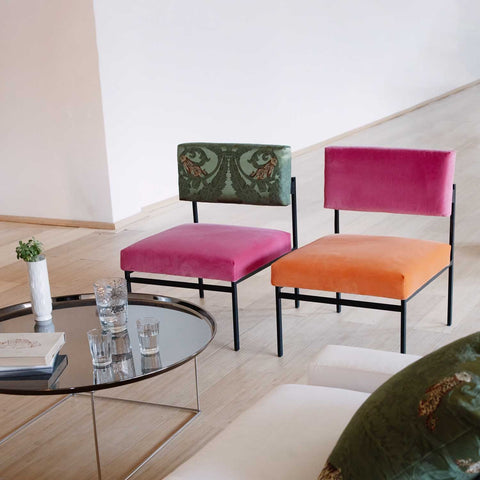 organic lounge chairs in colourful orange and pink velvet