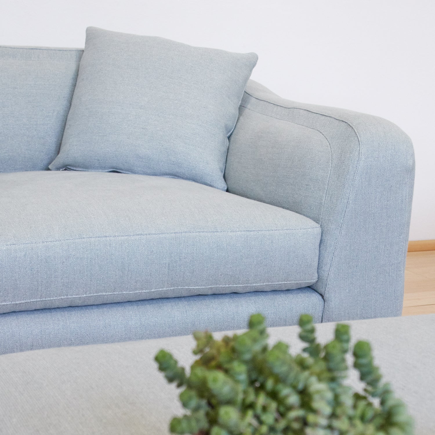 cushion detail on sustainable armchair