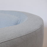 curved backrest on sustainable armchair